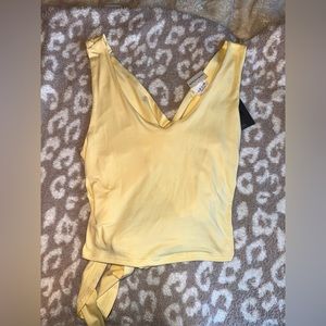 Le Lis open cross tie back yellow tank